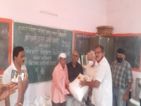 Foodgrain distribution at Tapalwadi, Neral